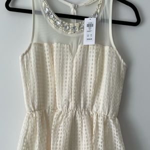 Flare dress with embellished neckline